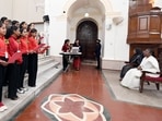 New Delhi, Dec 24 (ANI): President Droupadi Murmu listens to a carol sung by children during her visit to Sacred Heart Cathedral on the eve of Christmas day, in New Delhi on Saturday. (ANI Photo) (ANI) New Delhi, Dec 24 (ANI): President Droupadi Murmu listens to a carol sung by children during her visit to Sacred Heart Cathedral on the eve of Christmas day, in New Delhi on Saturday. (ANI Photo) (ANI)