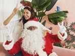 Anushka Sharma poses with Santa Claus as she celebrates Christmas.