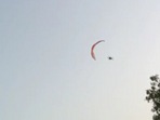Screenshot of the video, moments before the man fell on the ground after losing control while in the air.
