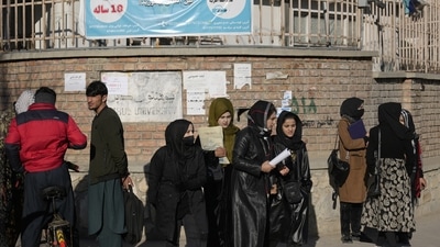 Afghanistan: Afghan women students stand outside the Kabul University. (AP)