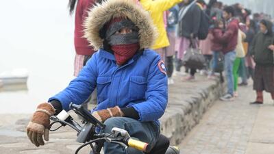 A child covered in multiple layers of woollens on Chandigarh’s coldest December day in three years. (Keshav Singh/HT)