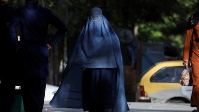 Afghanistan: An Afghan woman walks on a street in Kabul, Afghanistan. (Reuters)