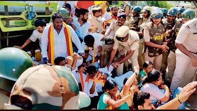 Police personnel detain Karnataka Rakshana Vedike supporters during a protest over the Maharashtra-Karnataka border dispute, at Hire Bagewadi, Belagavi (ANI)