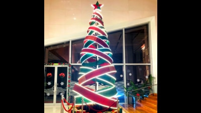 This 22-foot Christmas tree at Vivanta New Delhi, Dwarka is a vision, standing tall in the premises of Vivanta New Delhi, Dwarka. Made of recycled material such as metal frames and steel pipes, this tree moulded in a circular structure is sparkling with glitter paper and LED lights. This 22-foot Christmas tree at Vivanta New Delhi, Dwarka is a vision, standing tall in the premises of Vivanta New Delhi, Dwarka. Made of recycled material such as metal frames and steel pipes, this tree moulded in a circular structure is sparkling with glitter paper and LED lights.