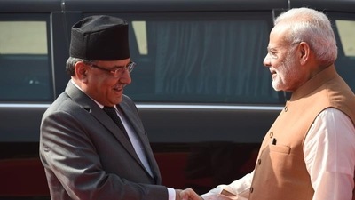 Prime Minister Narendra Modi (R) with Prime Minister of Nepal Pushpa Kamal Dahal ‘Prachanda’. (AFP)