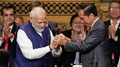 India's Prime Minister Narendra Modi, left, holds the gavel with Indonesia's President Joko Widodo during handover ceremony at the G20 Leaders' Summit, in Nusa Dua, Bali, Indonesia in November. 16, 2022. (Willy Kurniawan/Pool Photo via AP, File) India's Prime Minister Narendra Modi, left, holds the gavel with Indonesia's President Joko Widodo during handover ceremony at the G20 Leaders' Summit, in Nusa Dua, Bali, Indonesia in November. 16, 2022. (Willy Kurniawan/Pool Photo via AP, File)