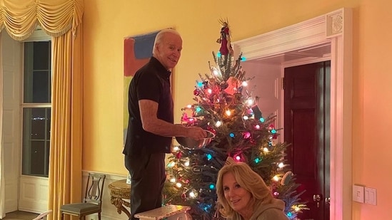 US President Joe Biden decorates Christmas tree with his wife Jill. (Twitter) 