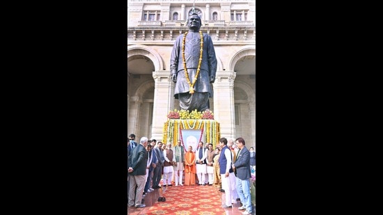Chief minister Yogi Adityanath along with deputy chief ministers Keshav Prasad Maurya and Brajesh Pathak and cabinet minister Swatantra Dev Singh and others paying floral tribute to the statue of Bharat Ratna and former Prime Minister of India Atal Bihari Vajpayee on his birth anniversary at Lok Bhawan in Lucknow on Sunday. (HT PHOTO)