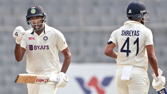 India's Ravichandran Ashwin, left, and Shreyas Iyer celebrates after scoring the final run to beat Bangladesh on the fourth day of the second cricket test match, in Dhaka, Bangladesh, Sunday, Dec. 25, 2022.(PTI)