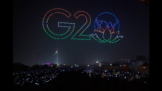 Several drones fly in formation to create an image of G20 symbol to mark India's presidency of G20, December 19, 2022 (AP)