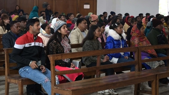 People gather at a church in Chandigarh to offer prayers.(Keshav Singh/HT Photo)