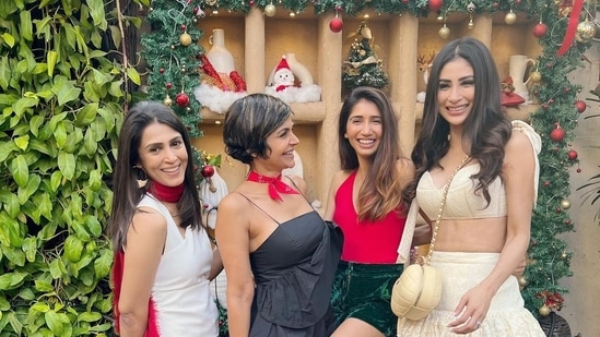 Mouni Roy and Mandira Bedi: Best friends Mouni and Mandira celebrated Christmas together with their friends. The former shared images of her celebration on her Instagram handle and captioned it, "Santa s naughty list right here."&nbsp;(Instagram/@imouniroy)