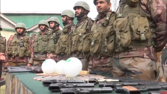 Police along with Army recovered a huge cache of arms and ammunition in north Kashmir's Baramulla district. (ANI)