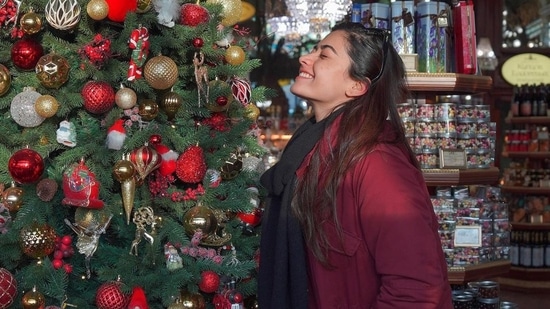 Rashmika Mandanna: The Pushpa actor shared a throwback picture with a Christmas tree which she had taken only to post on December 25. Wishing her fans, she wrote, "This time I already had a Christmas picture and I took this only keeping in mind that I needed a picture to wish you all… so Merry Christmas my loves…"(Instagram/@rashmikamandanna)