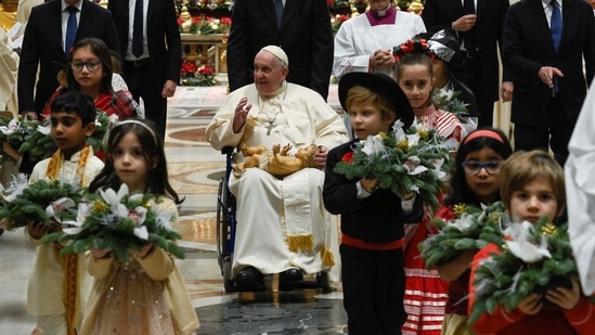 Pope Francis celebrates Christmas Eve mass in St. Peter's Basilica at the Vatican, December 24, 2022. (Vatican Media/?Handout via REUTERS)