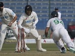 New Zealand's Tom Blundell, center, reacts after stump out to Pakistan's Shan Masood, right, during the first day of first test cricket match between Pakistan and New Zealand, in Karachi. New Zealand's Tom Blundell, center, reacts after stump out to Pakistan's Shan Masood, right, during the first day of first test cricket match between Pakistan and New Zealand, in Karachi.