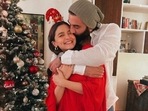 Christmas 2022: Ranbir Kapoor kisses Alia Bhatt (left); Ranbir and Alia pose with family during annual Christmas lunch. Christmas 2022: Ranbir Kapoor kisses Alia Bhatt (left); Ranbir and Alia pose with family during annual Christmas lunch.