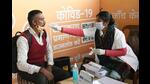 A health worker collects swab samples of a passenger at the Jaiprakash Narayan Airport in Patna on Monday. (Santosh Kumar/HT Photo) A health worker collects swab samples of a passenger at the Jaiprakash Narayan Airport in Patna on Monday. (Santosh Kumar/HT Photo)