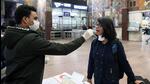 A healthcare worker collects a swab sample from a passenger at railway station in Patna on Monday. (ANI) A healthcare worker collects a swab sample from a passenger at railway station in Patna on Monday. (ANI)