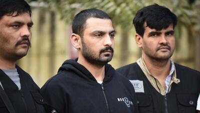 Gurugram, India-December 15: A team of Special Task Force (STF) produces the Gangster Vikas Lagarpuria in a district court near Mini Secretariate. Gangster Vikas Lagarpuria who is the prime accused in a multi-crore heist in Gurugram was arrested at Delhi's Indira Gandhi International airport; Several cases of murder, robbery, and extortion have been lodged against the gangster in Delhi and Haryana, in Gurugram, India, on Thursday, 15 December 2022. (Photo by Parveen Kumar/Hindustan Times)(pic to go with Debashish Karmakar's Story)
