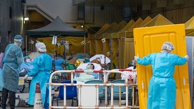 Hong Kong: Patients displaying Covid-19 symptoms at a temporary triage area. (Bloomberg) Hong Kong: Patients displaying Covid-19 symptoms at a temporary triage area. (Bloomberg)