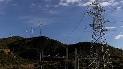 Greece Energy Crisis: Wind turbines are seen on a hill in front of a power station in Greece, (Reuters)