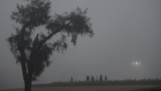 A view of Raj Ghat amid dense fog on a cold winter morning, in New Delhi on December 26. The Safdarjung weather station, which provides the representational data for Delhi, recorded a high of 16.2 degrees Celsius – five degrees below normal for this time of the season, and the lowest so far, and logged a minimum temperature of 5.3 degrees – three notches below normal and the joint-lowest of the season with December 23, HT reported.(Amit Sharma / ANI)