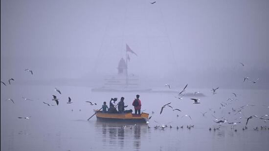 A thick mist above the Yamuna on Monday morning. (Raj K Raj/HT Photo)