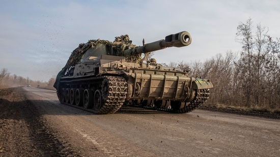 Russia-Ukraine War: Ukrainian servicemen ride a self-propelled howitzer, amid Russia's attack on Ukraine. (Reuters)