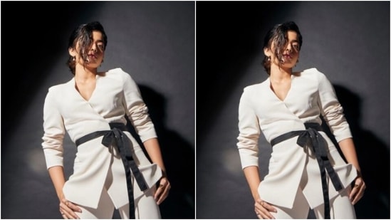 Rashmika's formal fashion diaries are equally droolworthy. A few days back, the actor looked ravishing in a white pantsuit, as she slayed boss babe vibes like a diva. (Instagram/@rashmika_mandanna)