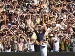 Anrich Nortje stretches as spectators react during the second Test between South Africa and Australia(AP) Anrich Nortje stretches as spectators react during the second Test between South Africa and Australia(AP)