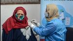 A woman gets a booster dose of the Covid-19 vaccine in Srinagar on Tuesday. (PTI) A woman gets a booster dose of the Covid-19 vaccine in Srinagar on Tuesday. (PTI)