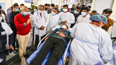 "The Delhi government is prepared for any kind of emergency. At LNJP, there are 2,000 beds and 450 of them are dedicated to COVID-19. If a need arises, we can dedicate all 2,000 beds for COVID-19... we can also increase this number by using nearby banquet halls and add an additional 500 beds for COVID-19, so there would no shortage," Manish Sisodia told reporters at the hospital. (HT Photo/Raj K Raj) "The Delhi government is prepared for any kind of emergency. At LNJP, there are 2,000 beds and 450 of them are dedicated to COVID-19. If a need arises, we can dedicate all 2,000 beds for COVID-19... we can also increase this number by using nearby banquet halls and add an additional 500 beds for COVID-19, so there would no shortage," Manish Sisodia told reporters at the hospital. (HT Photo/Raj K Raj)