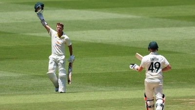 Australia's David Warner celebrates after scoring a century during the second cricket test between South Africa and Australia at the Melbourne Cricket Ground. (AP) Australia's David Warner celebrates after scoring a century during the second cricket test between South Africa and Australia at the Melbourne Cricket Ground. (AP)