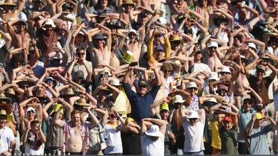 Anrich Nortje stretches as spectators react during the second Test between South Africa and Australia (AP) Anrich Nortje stretches as spectators react during the second Test between South Africa and Australia (AP)