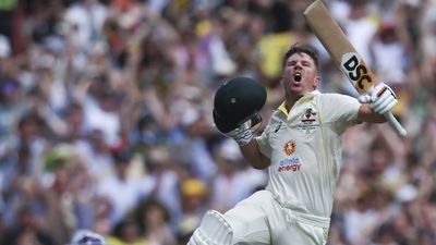 Australia's David Warner celebrates after scoring 200 runs during the second cricket test between South Africa and Australia at the Melbourne Cricket Ground. (AP) Australia's David Warner celebrates after scoring 200 runs during the second cricket test between South Africa and Australia at the Melbourne Cricket Ground. (AP)