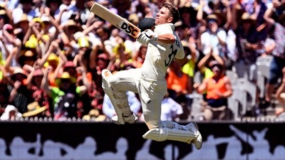 Australian batsman David Warner celebrates scoring his century on the second day of the second cricket Test match between Australia and South Africa Australian batsman David Warner celebrates scoring his century on the second day of the second cricket Test match between Australia and South Africa