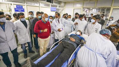Delhi deputy chief minister Manish Sisodia interacts with a doctor in a drill to take stock of preparations for Covid-19, at LNJP Hospital in New Delhi on Tuesday. (Raj K Raj/HT Photo) Delhi deputy chief minister Manish Sisodia interacts with a doctor in a drill to take stock of preparations for Covid-19, at LNJP Hospital in New Delhi on Tuesday. (Raj K Raj/HT Photo)