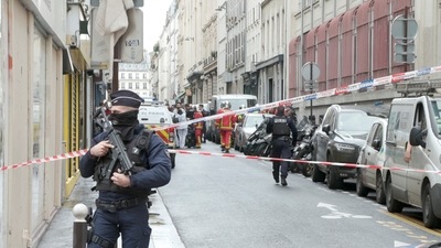 Paris Shooting: Members of emergency services work at the site where gunshots were fired. (Reuters)