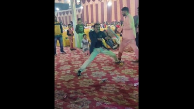 Man energetically dancing to Jimmy Jimmy at a wedding. (Instagram/@Rohit Vishwas)