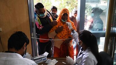 Noida, India- December 23, 2022: A health worker collects a swab sample for Covid-19 test at the District Hospital in Sector 30, in Noida, India, on Friday, December 23, 2022. (Photo by Sunil Ghosh / Hindustan Times) (Hindustan Times) Noida, India- December 23, 2022: A health worker collects a swab sample for Covid-19 test at the District Hospital in Sector 30, in Noida, India, on Friday, December 23, 2022. (Photo by Sunil Ghosh / Hindustan Times) (Hindustan Times)
