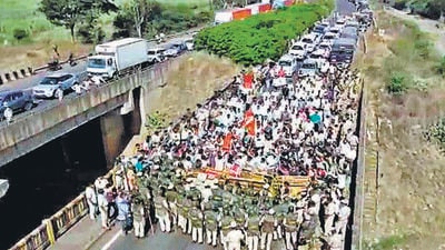 Protesters gathered near Kognoli Toll Plaza on Monday. (ANI) Protesters gathered near Kognoli Toll Plaza on Monday. (ANI)