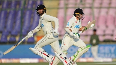 New Zealand's Devon Conway (L) and Tom Latham run between the wickets during the second day of the first cricket Test match between Pakistan and New Zealand at the National Stadium in Karachi on December 27, 2022. (Photo by Asif HASSAN / AFP) (AFP) New Zealand's Devon Conway (L) and Tom Latham run between the wickets during the second day of the first cricket Test match between Pakistan and New Zealand at the National Stadium in Karachi on December 27, 2022. (Photo by Asif HASSAN / AFP) (AFP)