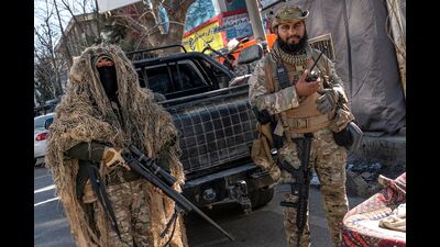 Taliban security personnel stand guard along a road in Kabul on December 21, 2022 (AFP) Taliban security personnel stand guard along a road in Kabul on December 21, 2022 (AFP)