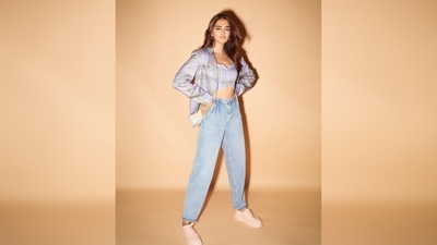 Pooja Hegde wore a cropped blouse and jacket set which she paired with ankle-length denim and sneakers.&nbsp; (Instagram/@hegdepooja)
