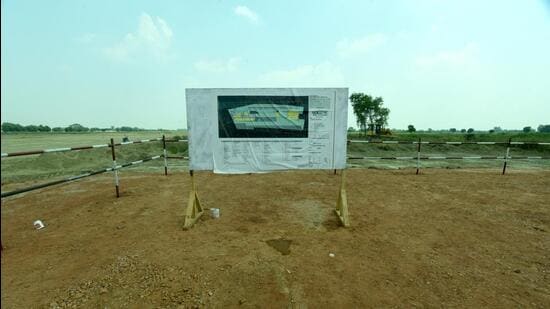 Construction work underway at the Jewar airport site in Greater Noida. (Sunil Ghosh/HT Photo)