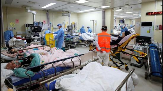 Medical workers attend to patients at the intensive care unit of the emergency department at Beijing Chaoyang hospital, amid the coronavirus disease (Covid-19) outbreak in Beijing, China, on Tuesday. (VIA REUTERS)