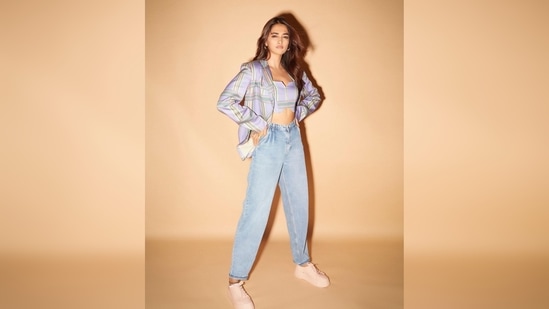 Pooja Hegde wore a cropped blouse and jacket set which she paired with ankle-length denim and sneakers. (Instagram/@hegdepooja)