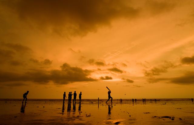 Howzzat! Children playing cricket at Juhu Beach, Mumbai. (Satyabrata Tripathy/HT Photo) Howzzat! Children playing cricket at Juhu Beach, Mumbai. (Satyabrata Tripathy/HT Photo)