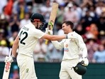Australian batsman Alex Carey (R) celebrates scoring his century with teammate Cameron Green (L) on the third day of the second cricket Test match between Australia and South Africa at the MCG in Melbourne on December 28, 2022. (Photo by William WEST / AFP) / -- IMAGE RESTRICTED TO EDITORIAL USE - STRICTLY NO COMMERCIAL USE --(AFP) Australian batsman Alex Carey (R) celebrates scoring his century with teammate Cameron Green (L) on the third day of the second cricket Test match between Australia and South Africa at the MCG in Melbourne on December 28, 2022. (Photo by William WEST / AFP) / -- IMAGE RESTRICTED TO EDITORIAL USE - STRICTLY NO COMMERCIAL USE --(AFP)